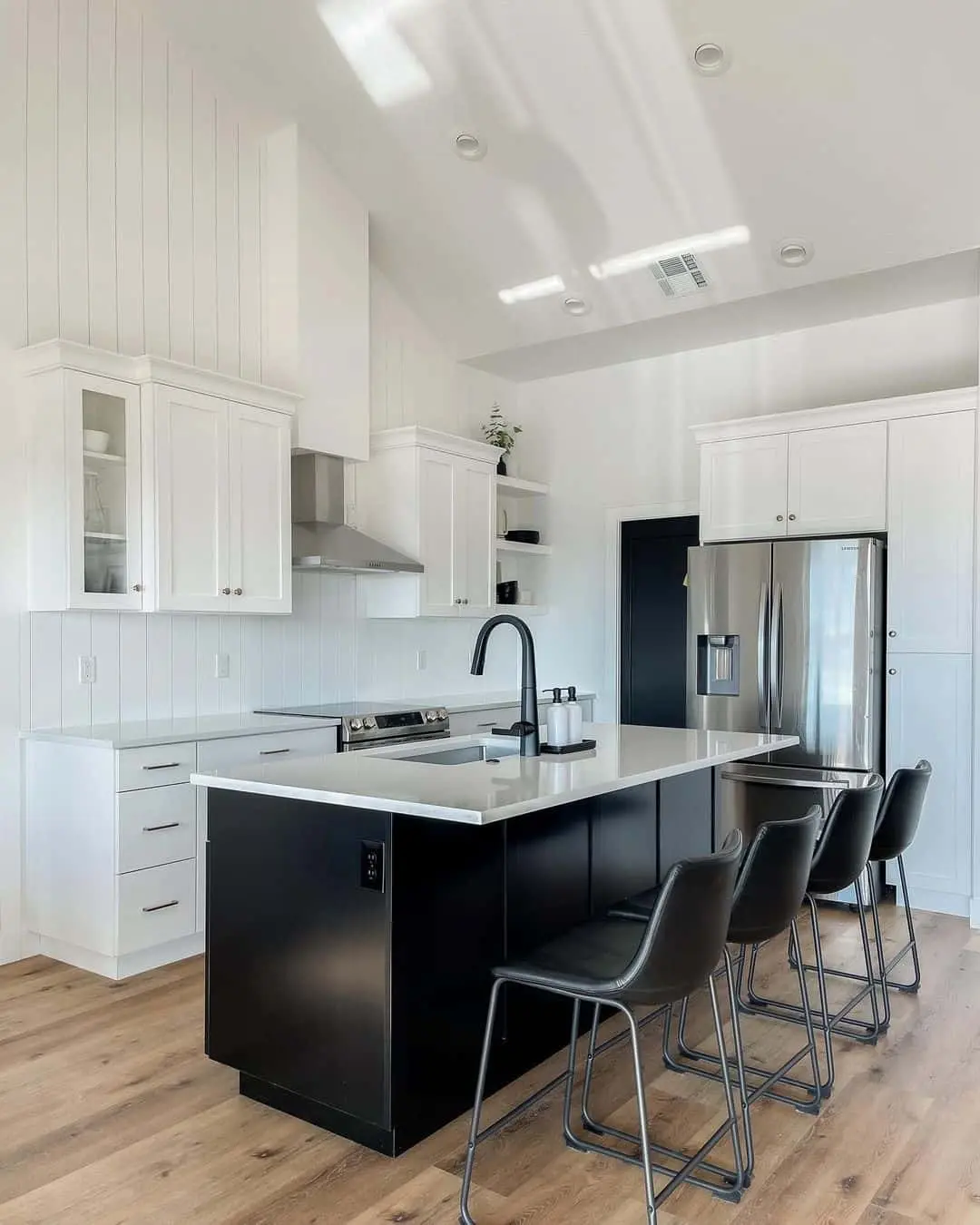 Matte Black Island with Integrated Outlets for Convenience