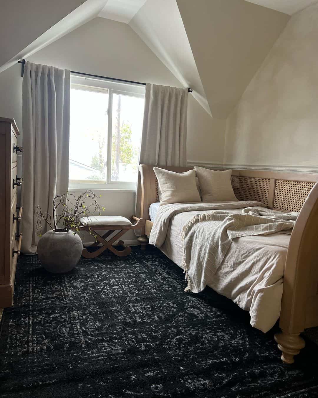 Cane Headboard Adds Natural Texture to Dark Bedroom
