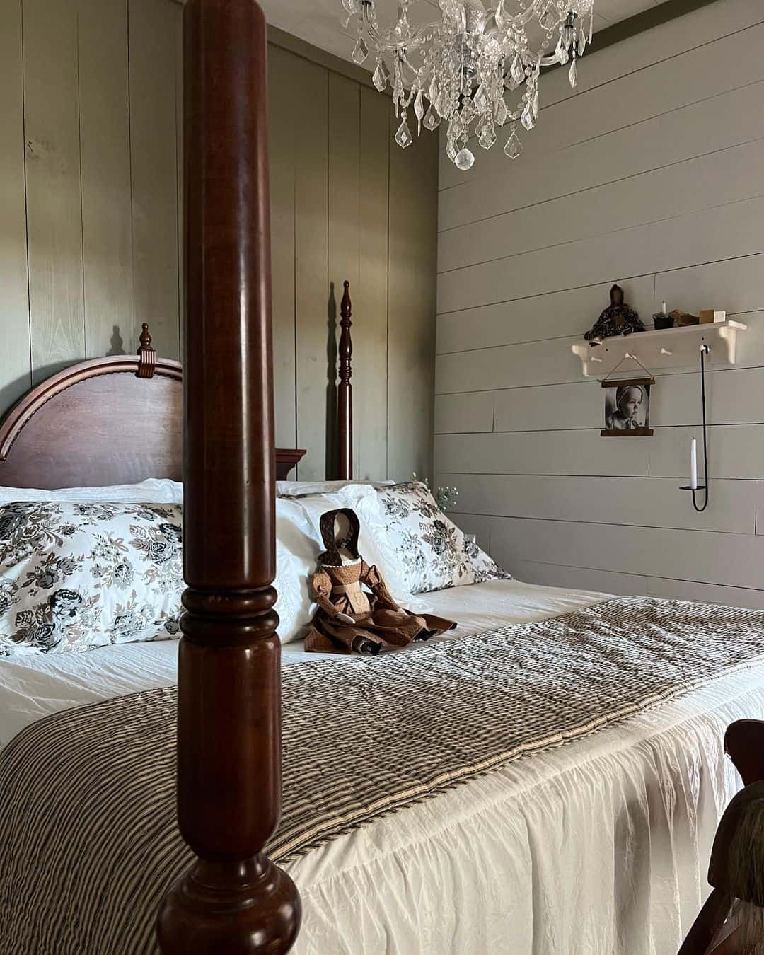 Dark Four-Poster Bed Anchors the Room