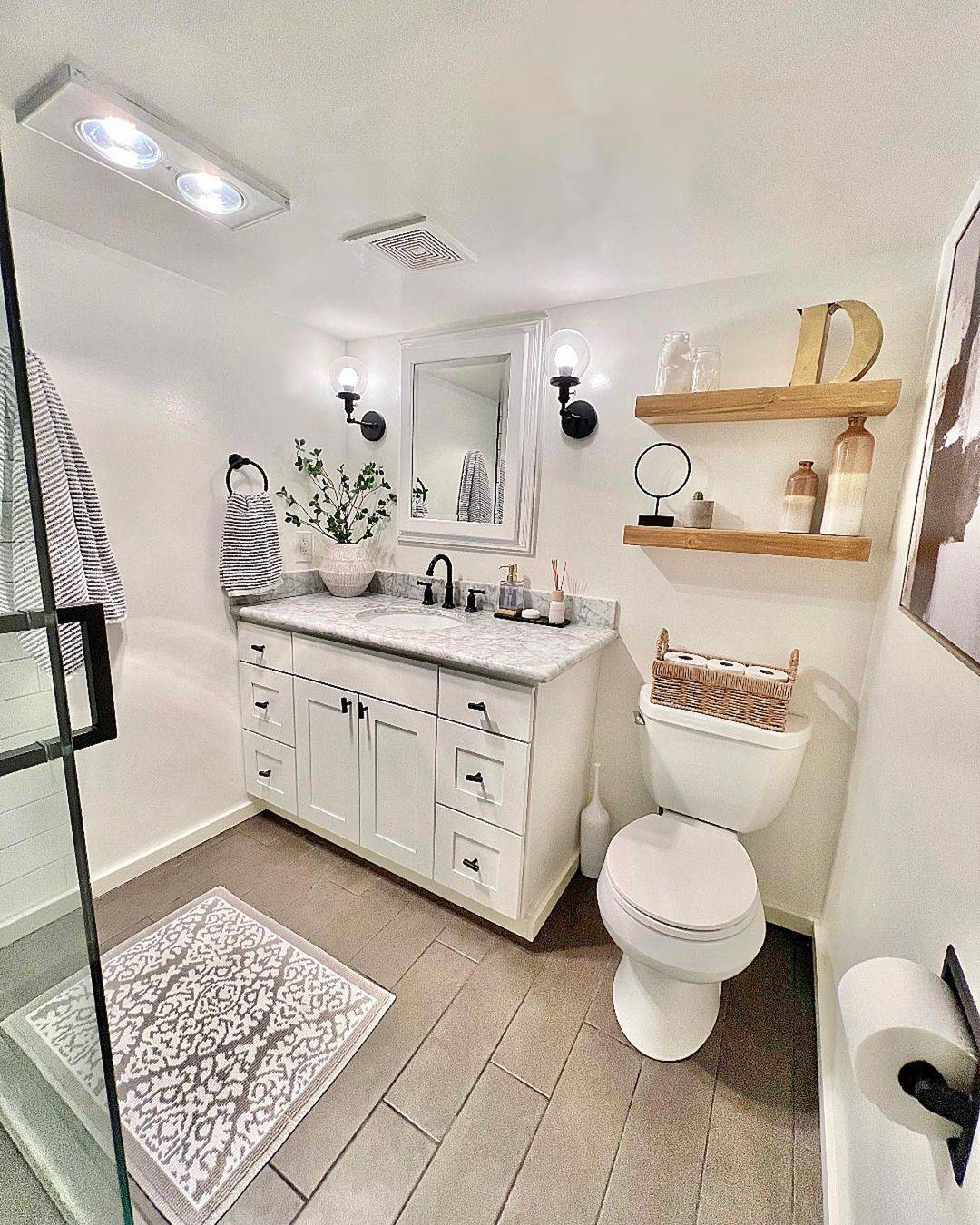 White Vanity with Black Globe Sconces