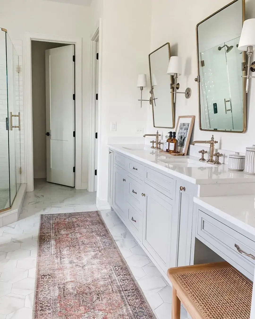 Clean Lines: Tall Gold Mirrors Flank Sconces
