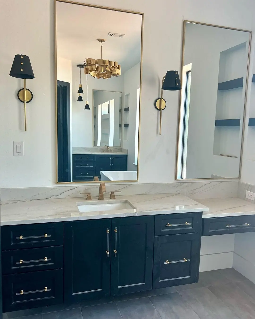 Gold and Black Contrast: Tall Mirrors with Cone Sconces