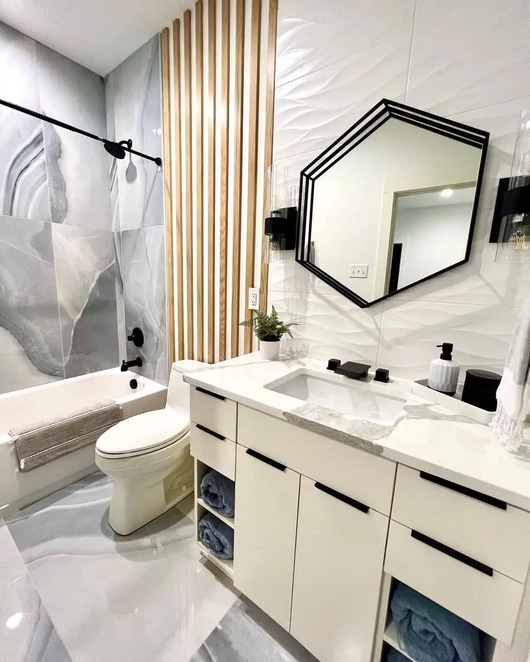 Geometric Drama: Hexagonal Mirror with Industrial Sconces