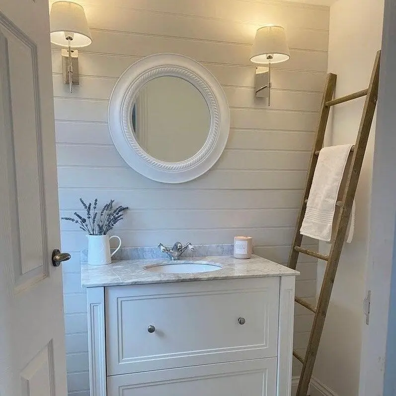 Round Mirror with Rope Detail and Side Sconces