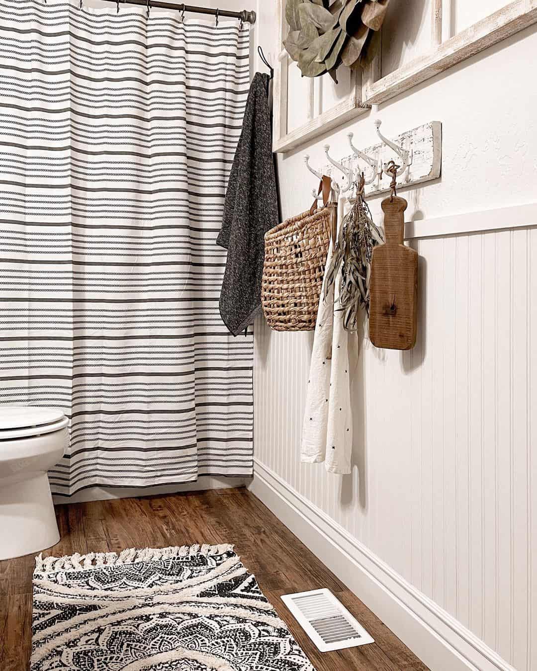 White Beadboard Walls With a Rustic Hook Display