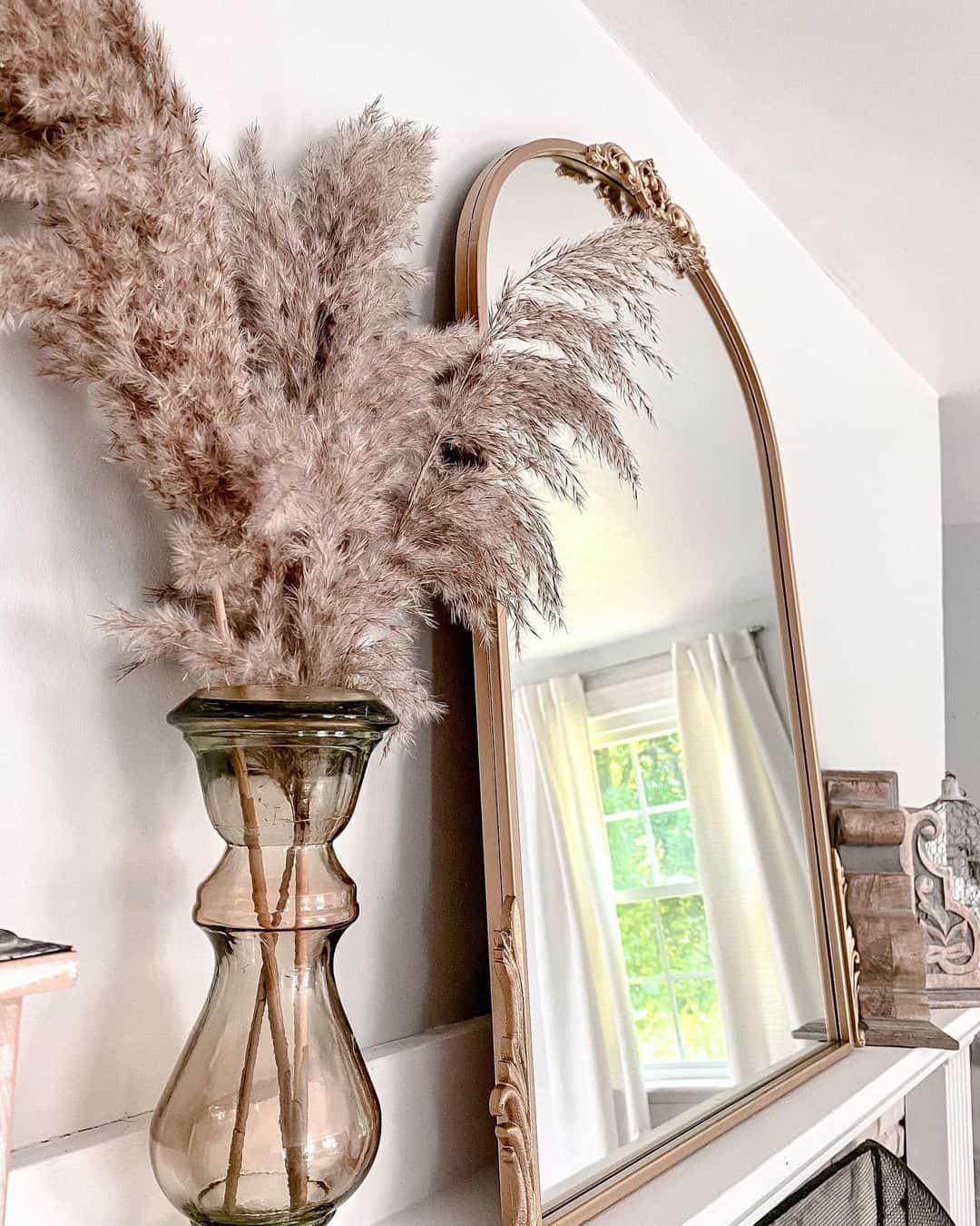 Frame Natural Light with an Ornate Arch Mirror