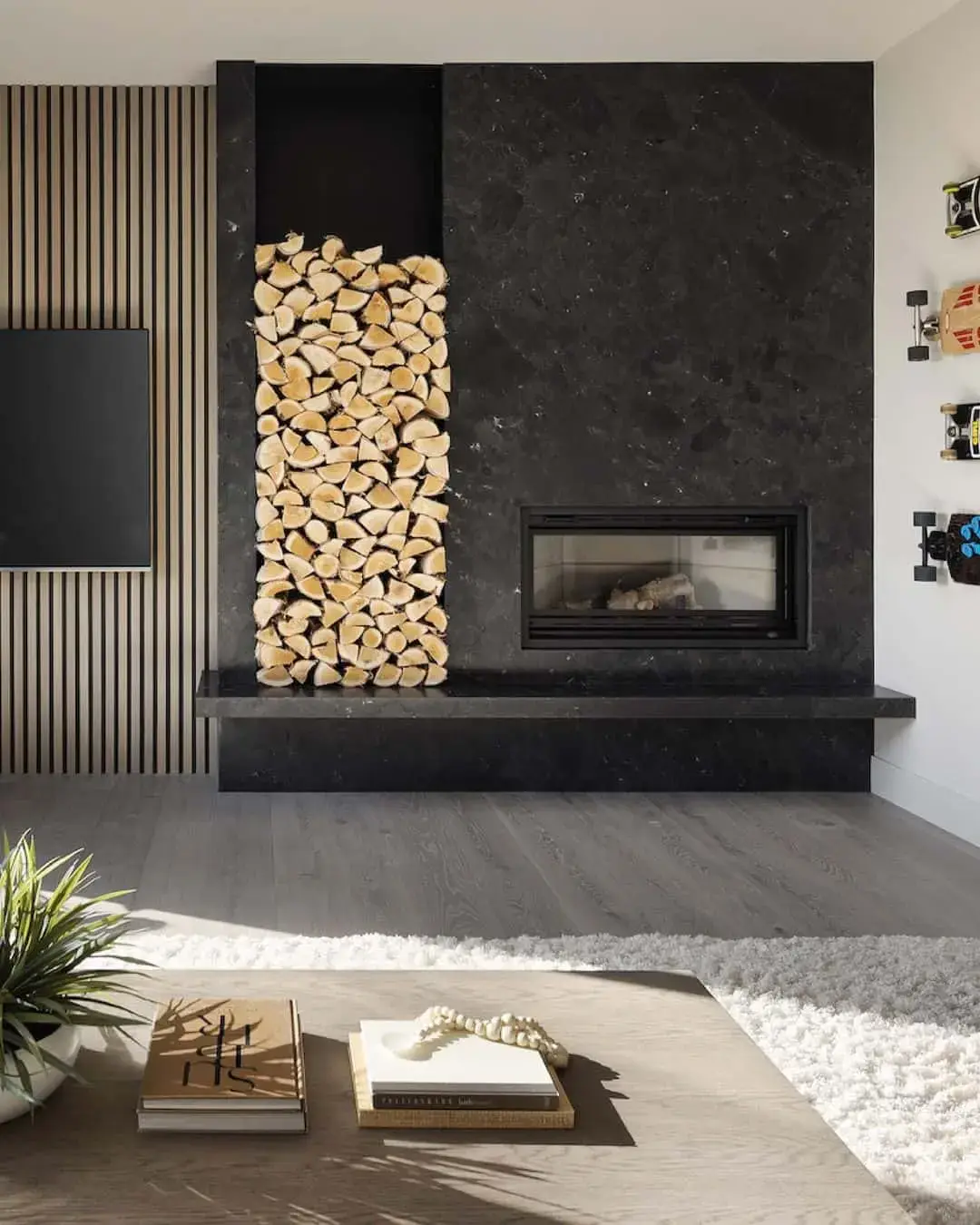 Neatly Stacked Logs Add Natural Texture to a Black Marble Fireplace