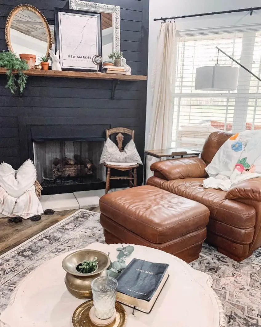 Layer an Ornate Mirror and Map Art Above Your Fireplace Mantel