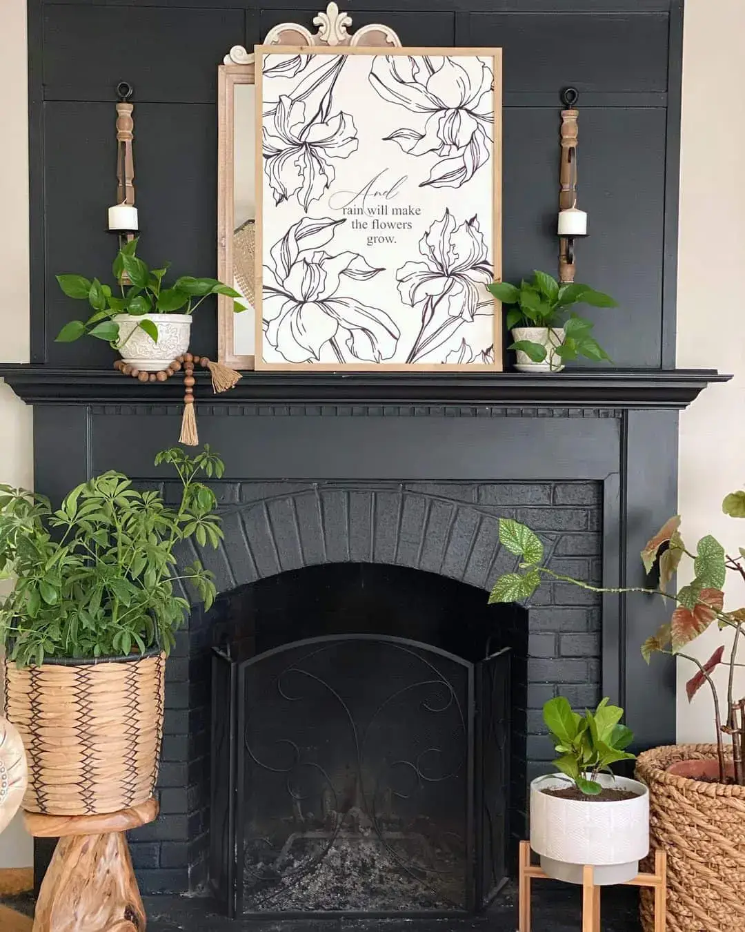 Soften a Black Fireplace with Framed Botanical Art and Plants