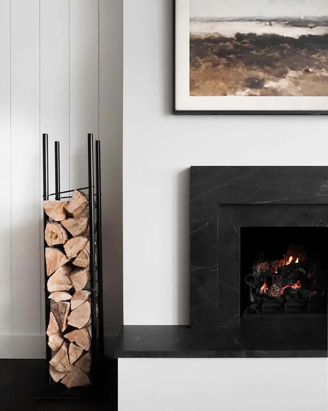 Keep Firewood Organized with a Tall Black Log Holder