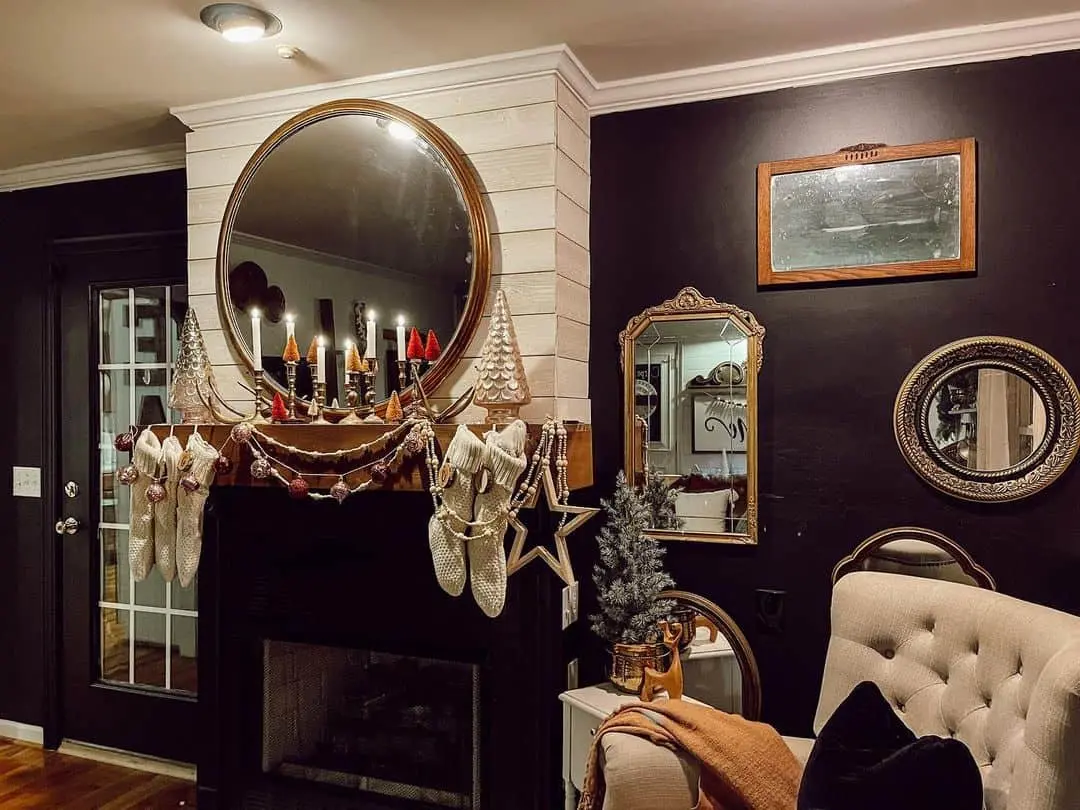 Gallery Wall of Mirrors Adds Depth to Black Walls