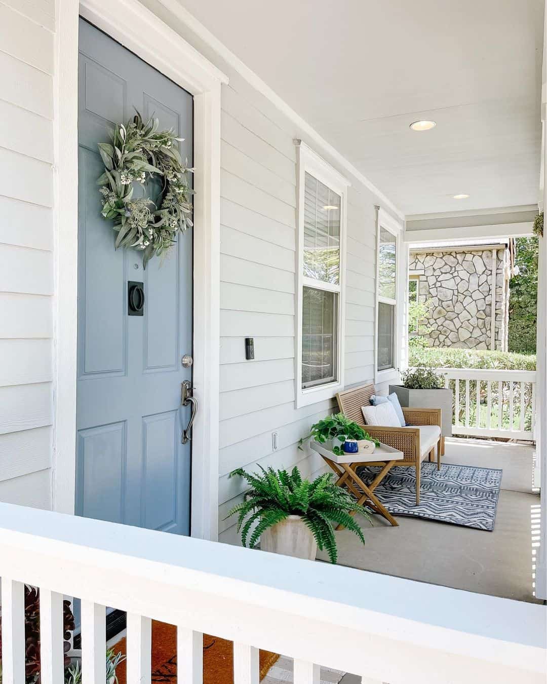 Subtle Texture with a Sage Wreath on a Light Blue Door