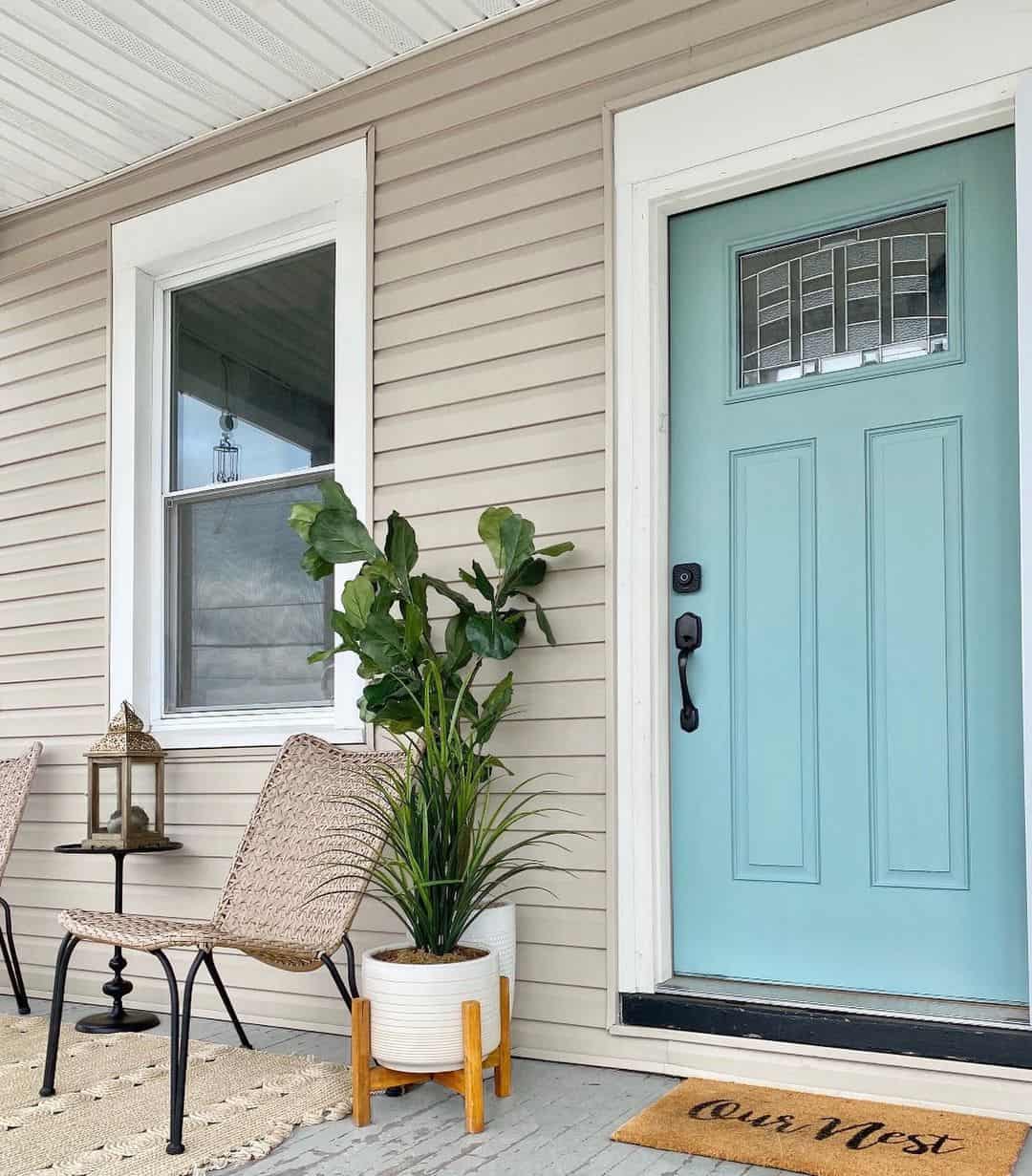 Vertical Greenery in a Tall White Planter on a Stand