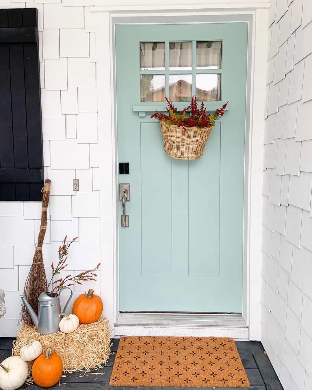 Woven Basket Hung On Door Displays Seasonal Blooms