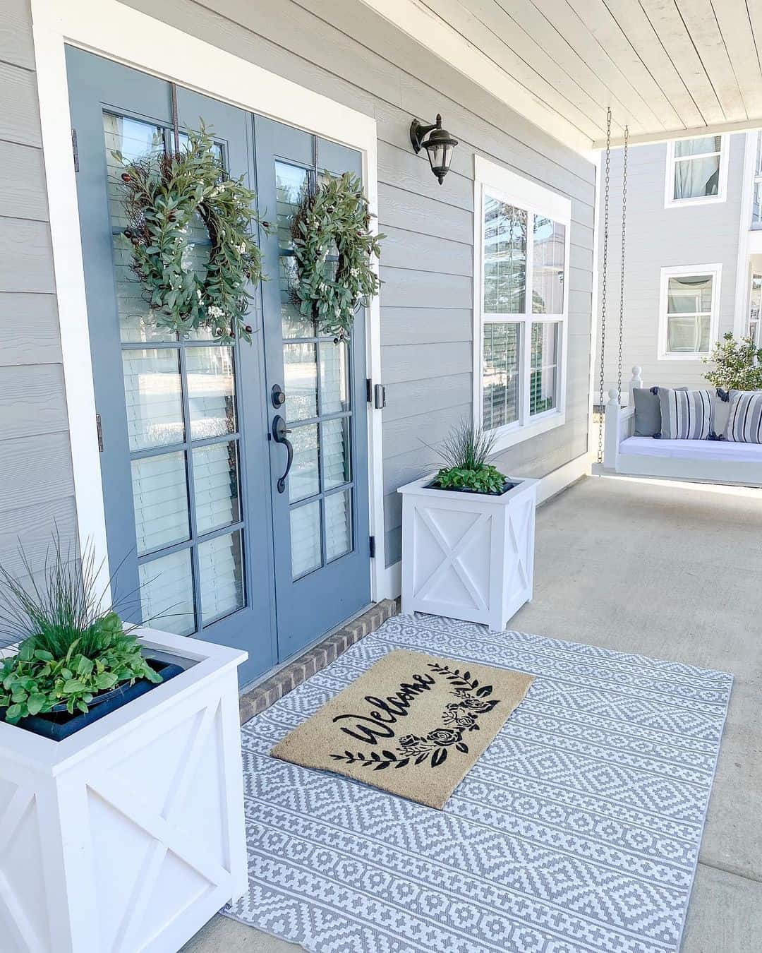 Symmetrical Style with Double Greenery Wreaths on French Doors