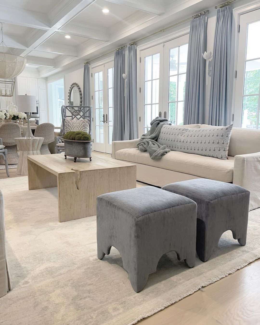 Sculptural Seating with Curved Leg Ottomans