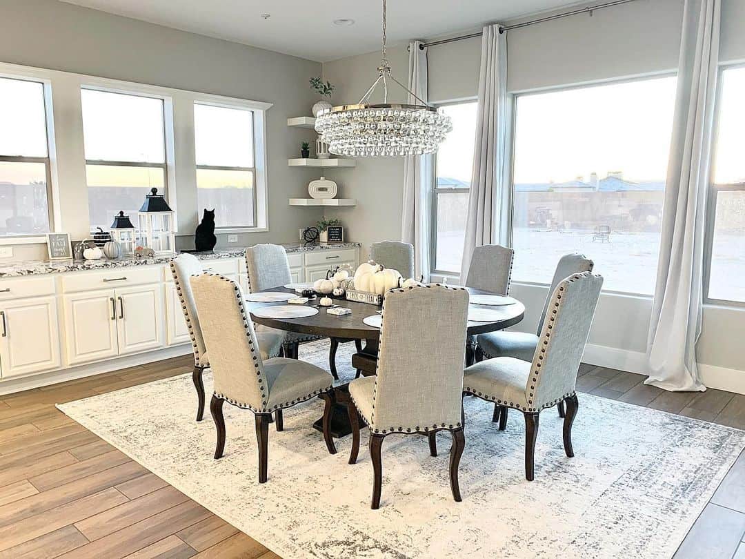 Crystal Chandelier Drapes Sparkle Above Round Table