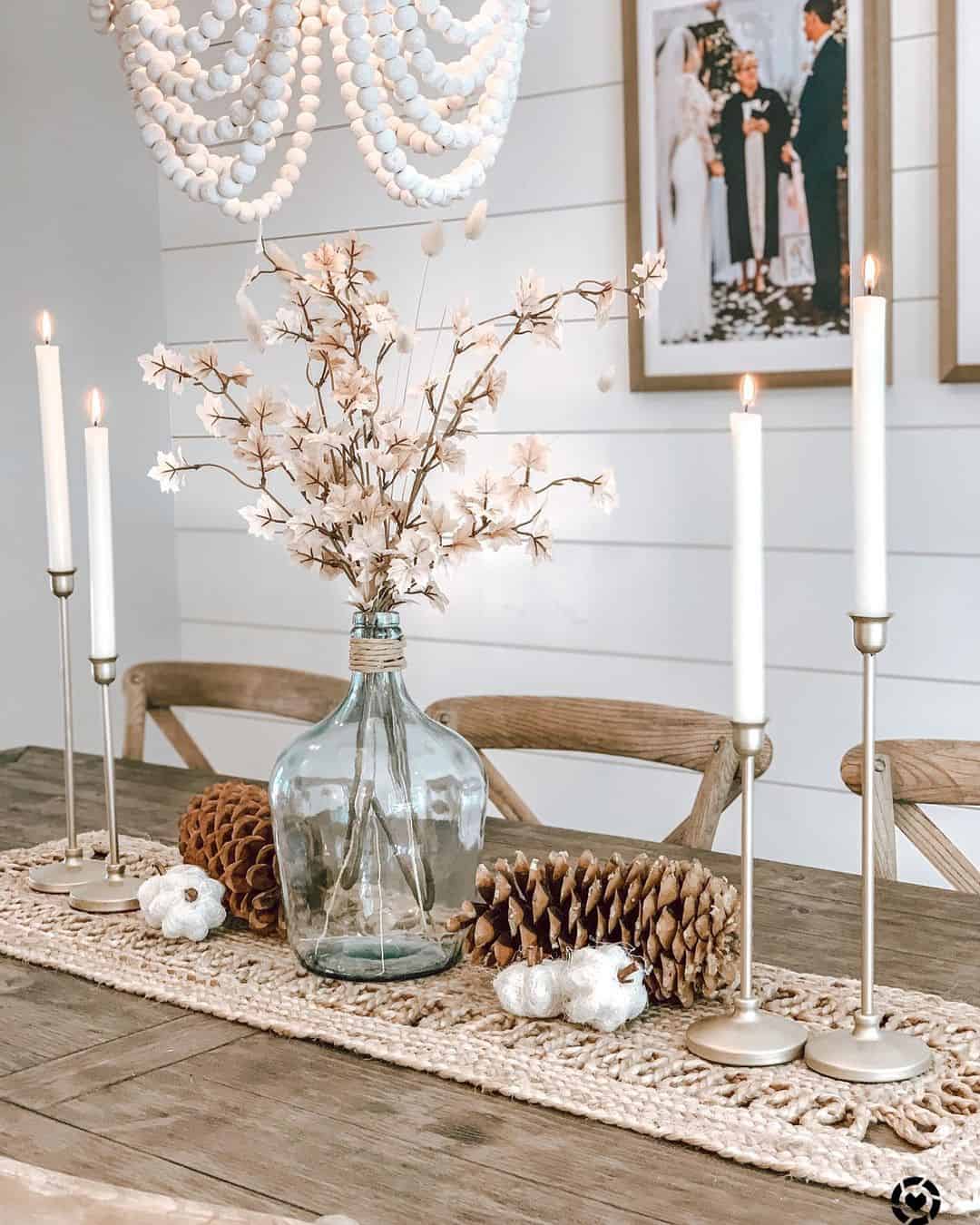 Glass Bottle Vase Anchors a Fall Vignette