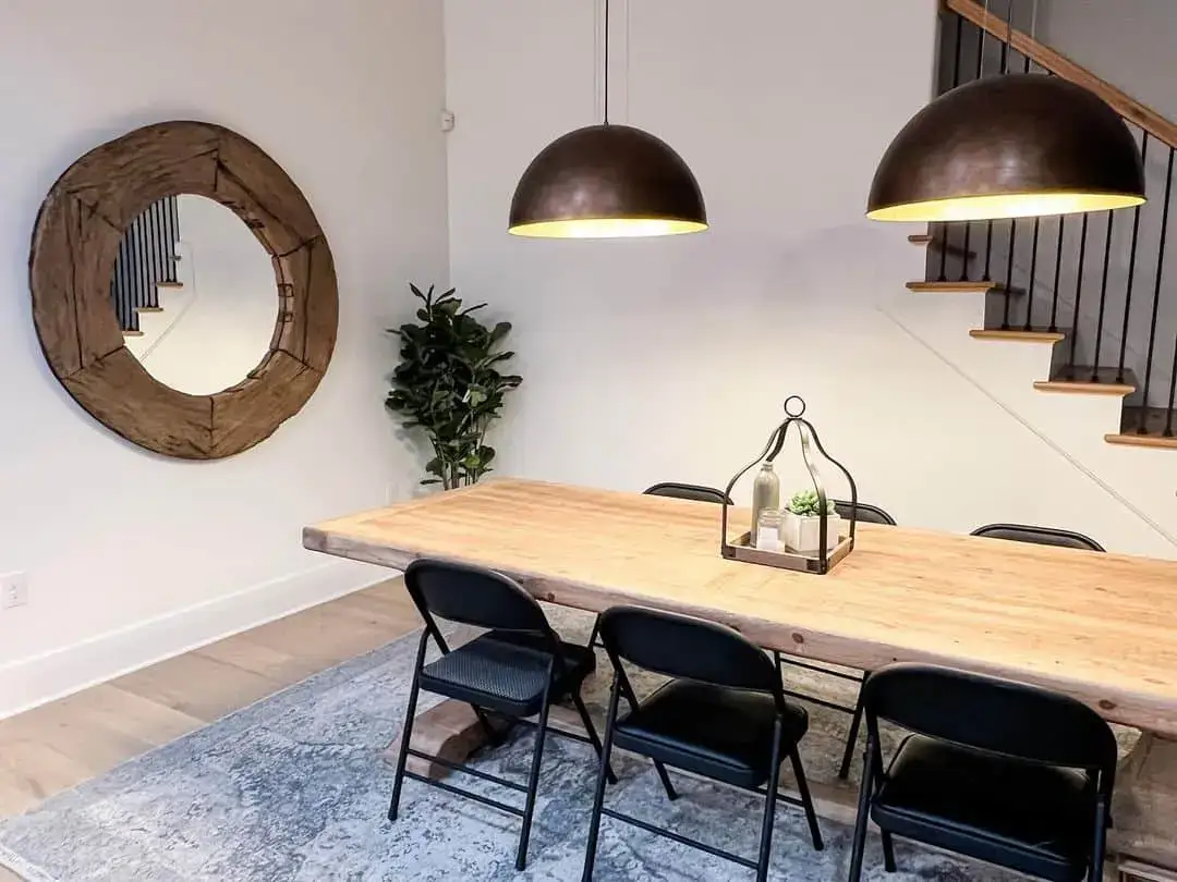 Bell-Shaped Lantern Holds A Miniature Greenery Vignette