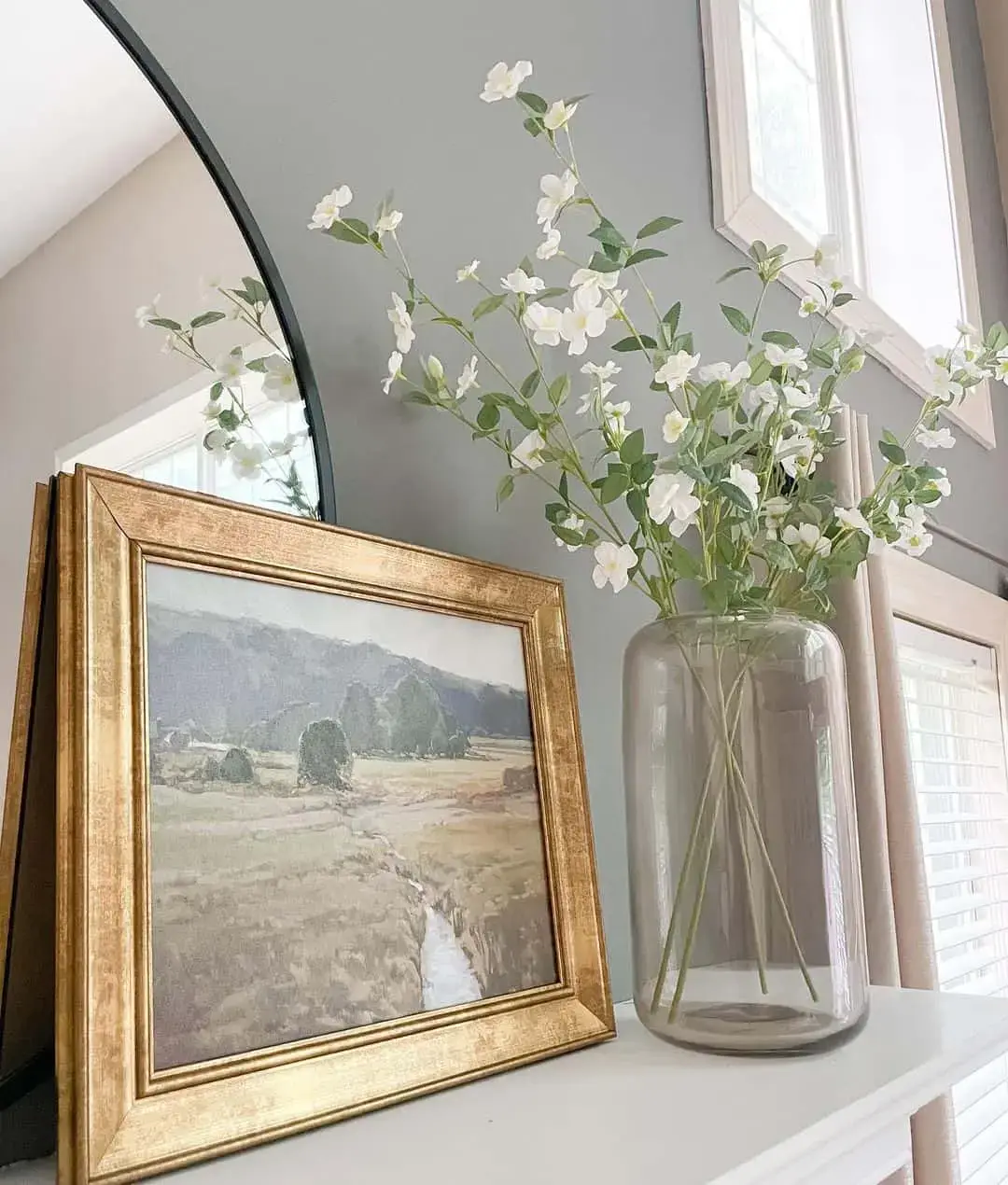 Introduce Airy Texture with a Tall Vase of White Flowers