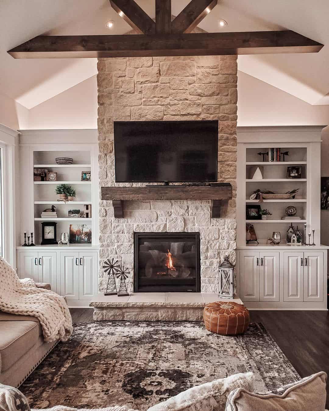 Stone Fireplace Wall with Exposed Beams for Rustic Appeal