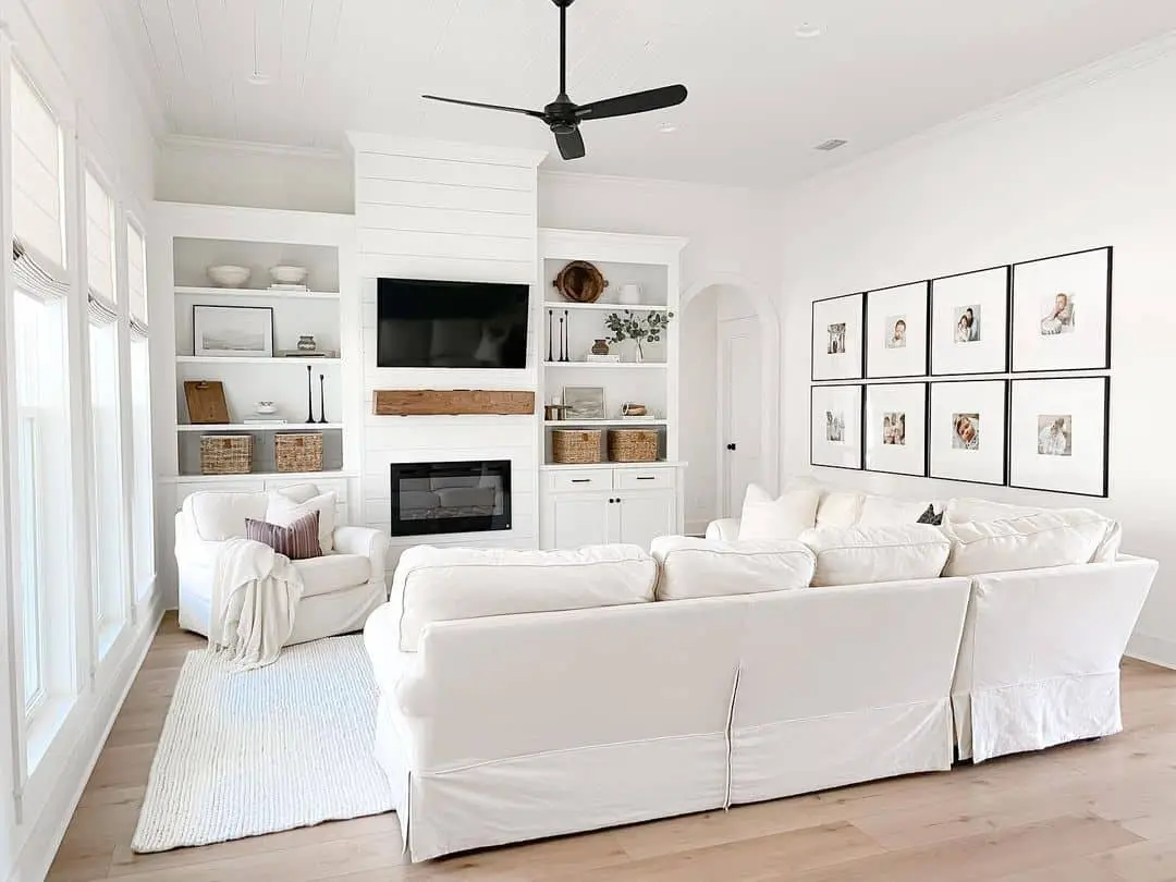 Gallery Wall of Black-Framed Photos Adds Personal Touch