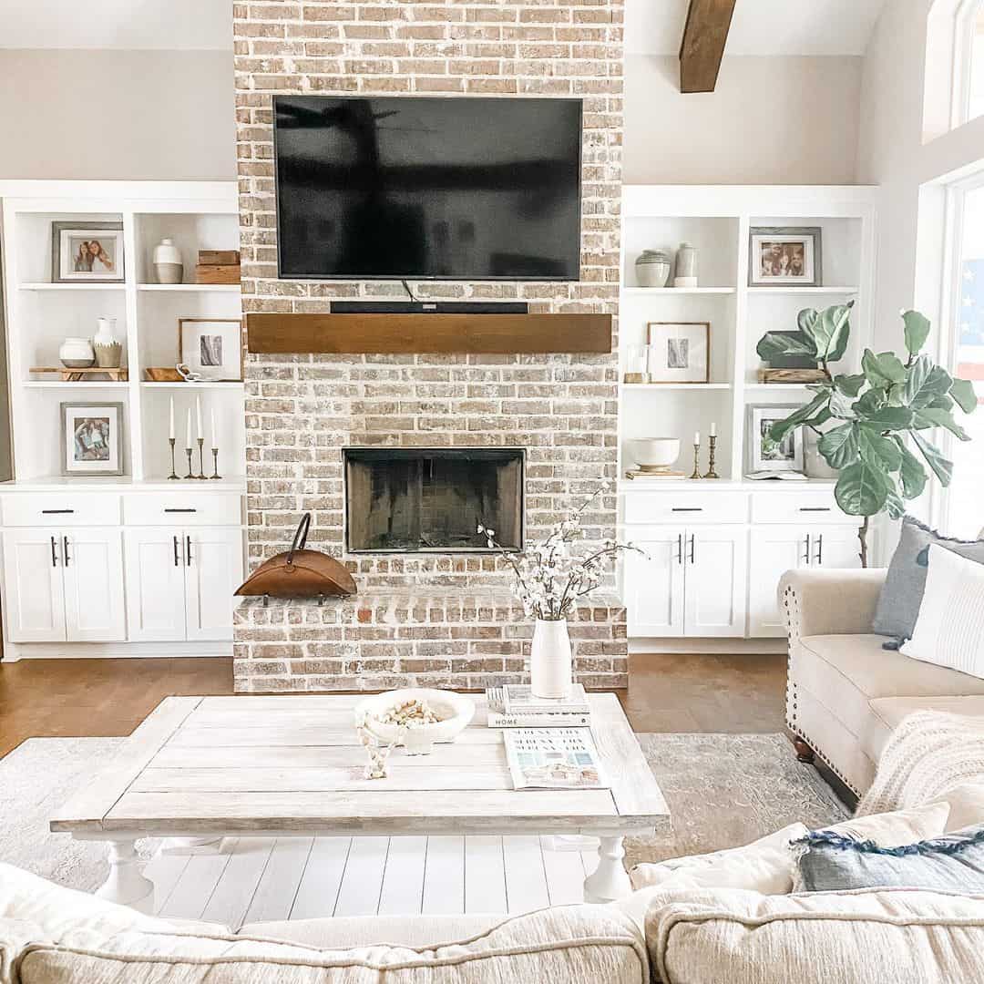 Brick Fireplace with Integrated White Built-Ins