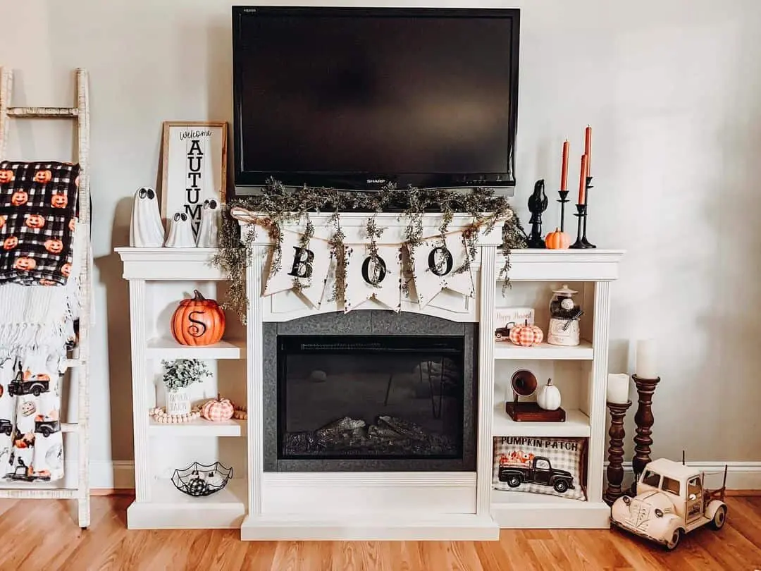 White Built-In Shelving for Seasonal Decor Around Fireplace