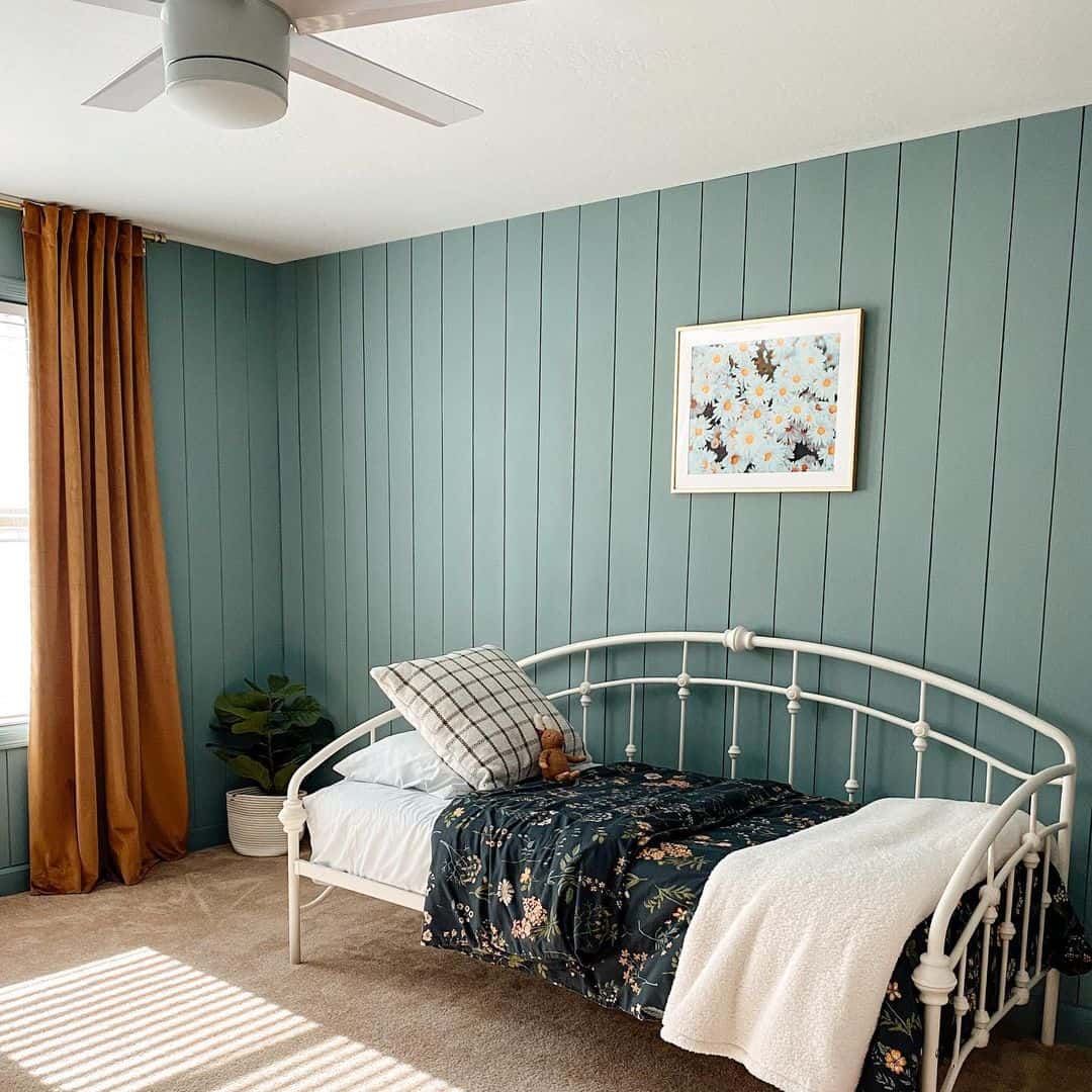 Warm Amber Curtains Against Teal Board and Batten Walls