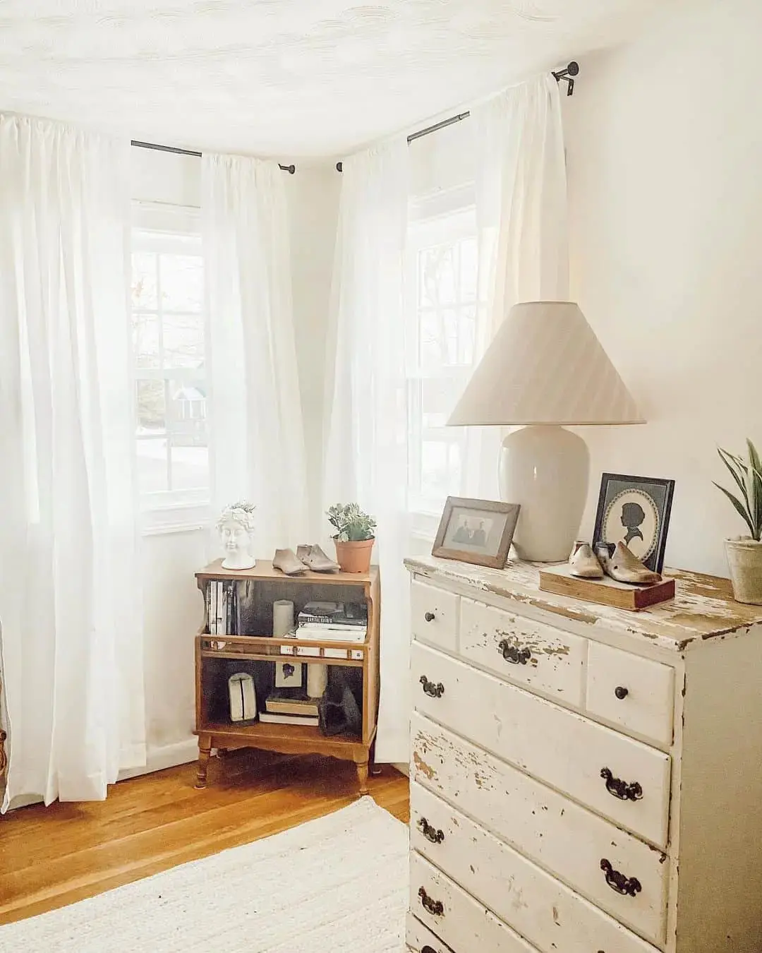 Corner Curtains Soften Windows With Dark Rods