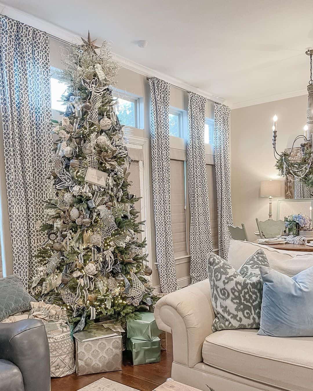 Patterned Floor-to-Ceiling Curtains Frame a Festive Christmas Tree