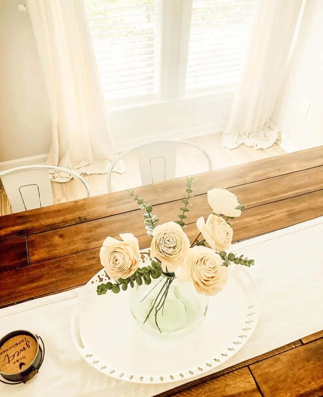 Soft Cream Roses and Eucalyptus in a Bubble Vase