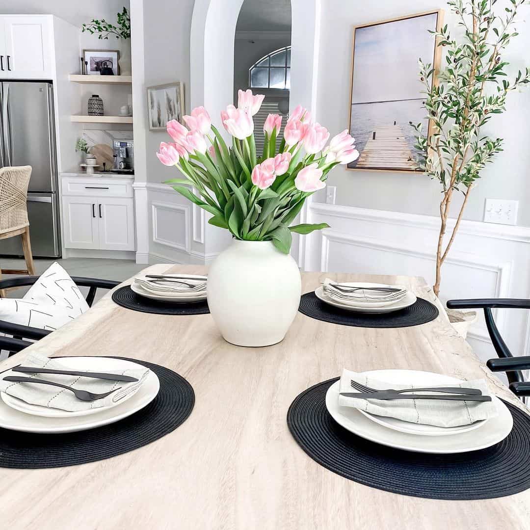 Round White Vase Holds a Generous Bouquet of Pink Tulips