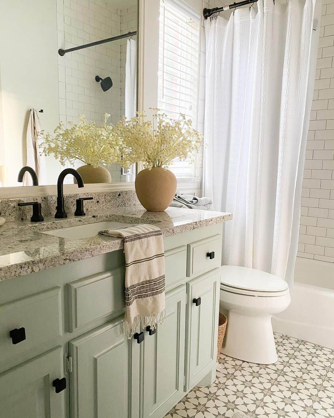 Pale Green Vanity With Square Knobs Adds a Fresh Look