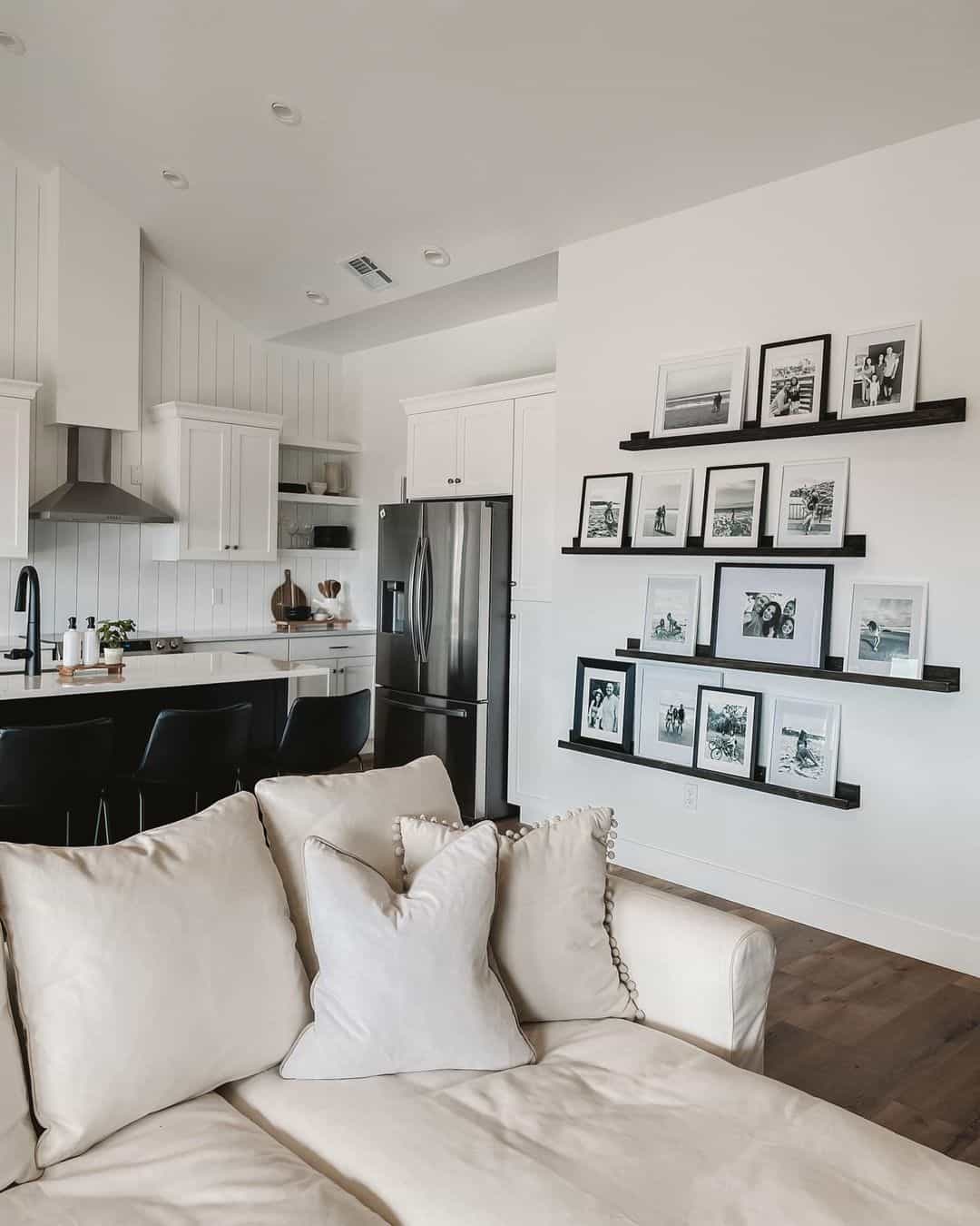 Gallery Walls With Varying Frame Heights Add Dimension