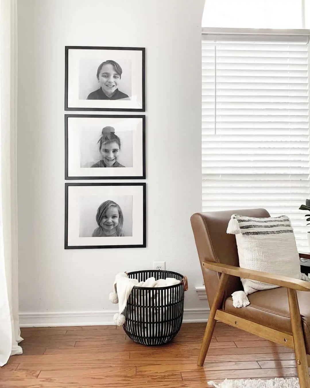 Three Identical Black Frames Create a Vertical Portrait Display