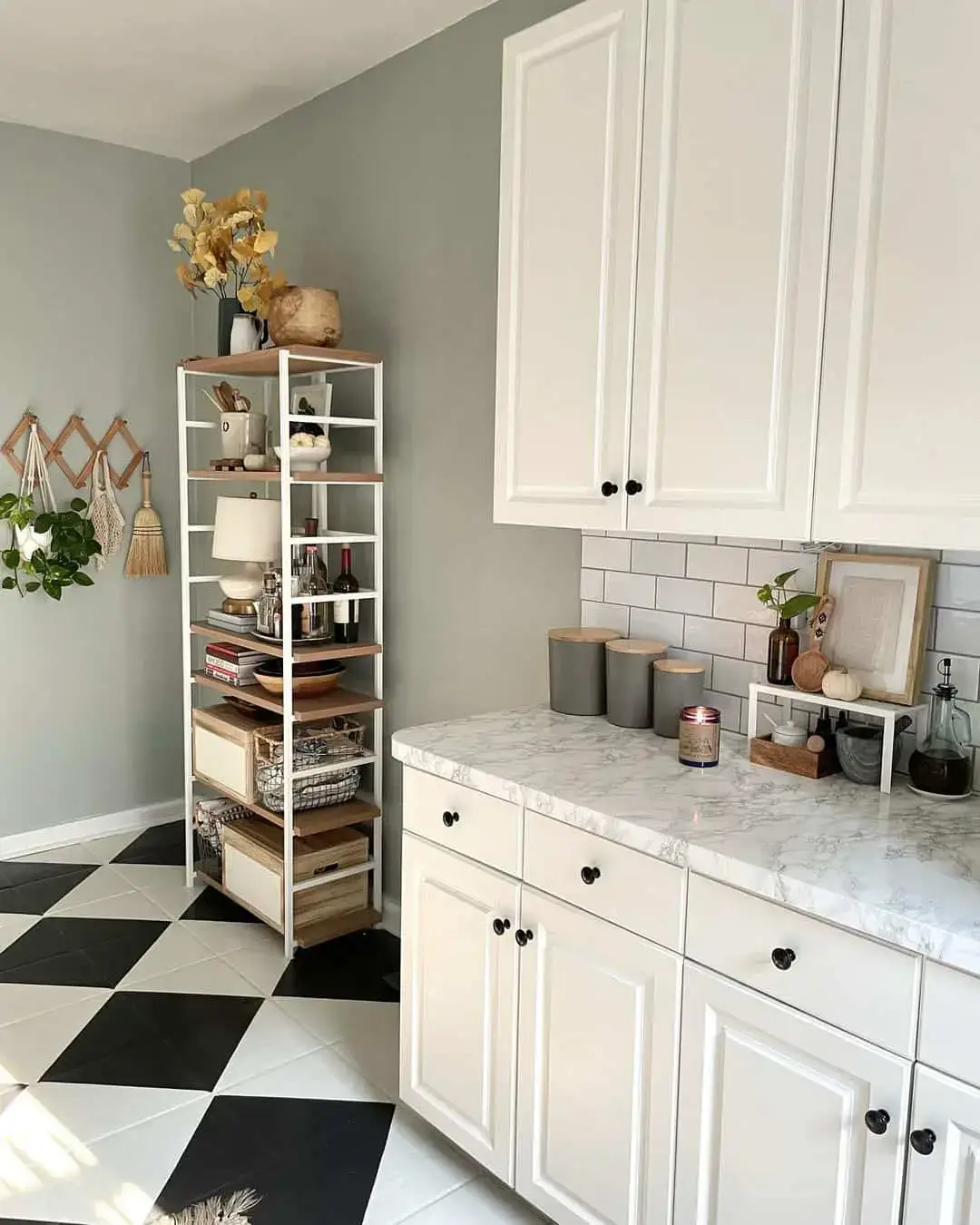 Bold Black and White Checkerboard Floors Ground the Kitchen