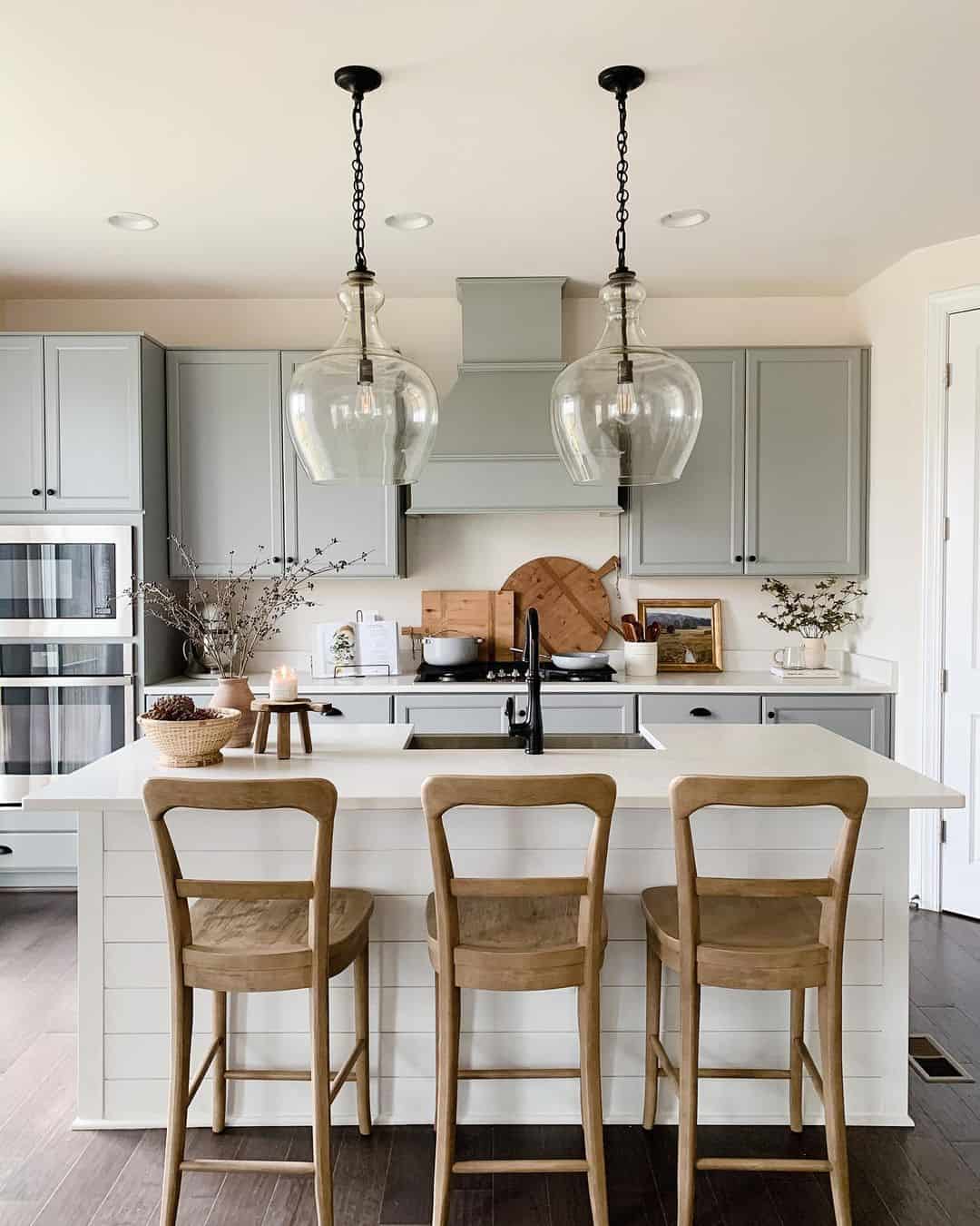 Warm Illumination from Glass Bell Jar Pendants