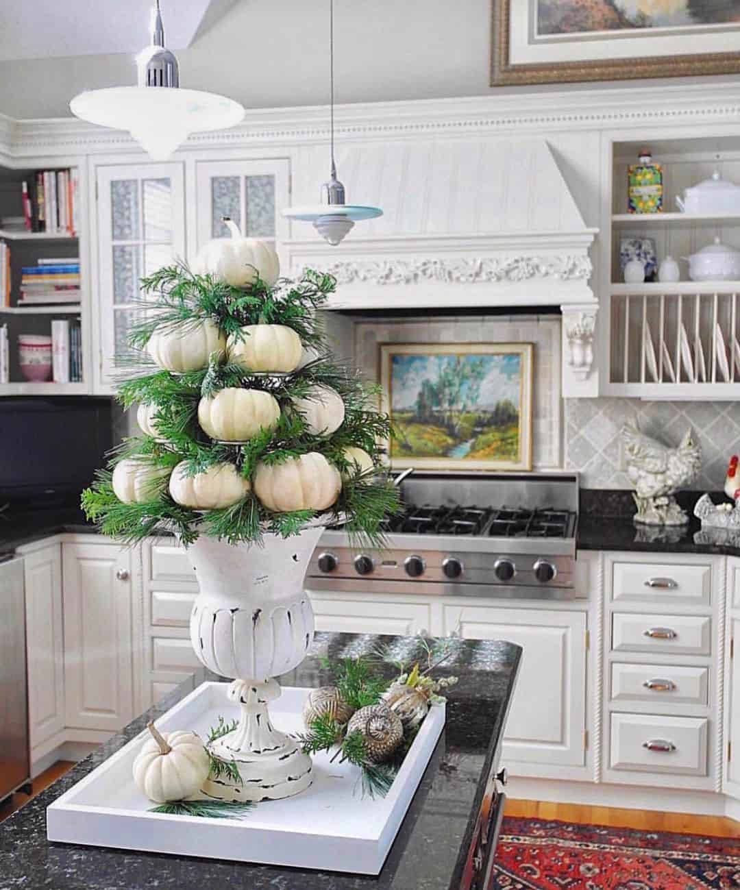 Tiered Pumpkin and Pine Centerpiece