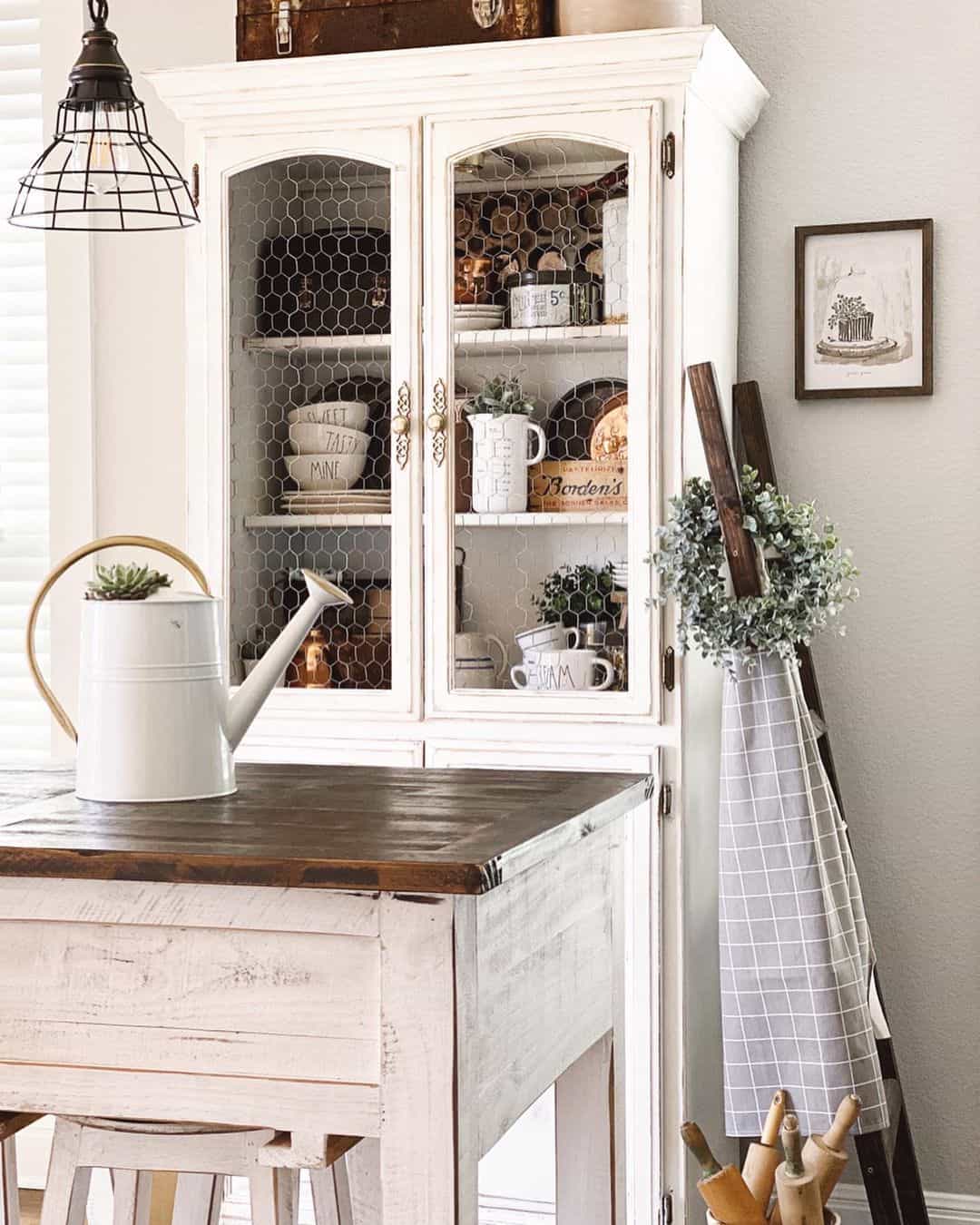 Showcase Dishes with Wire Mesh Cabinet Doors