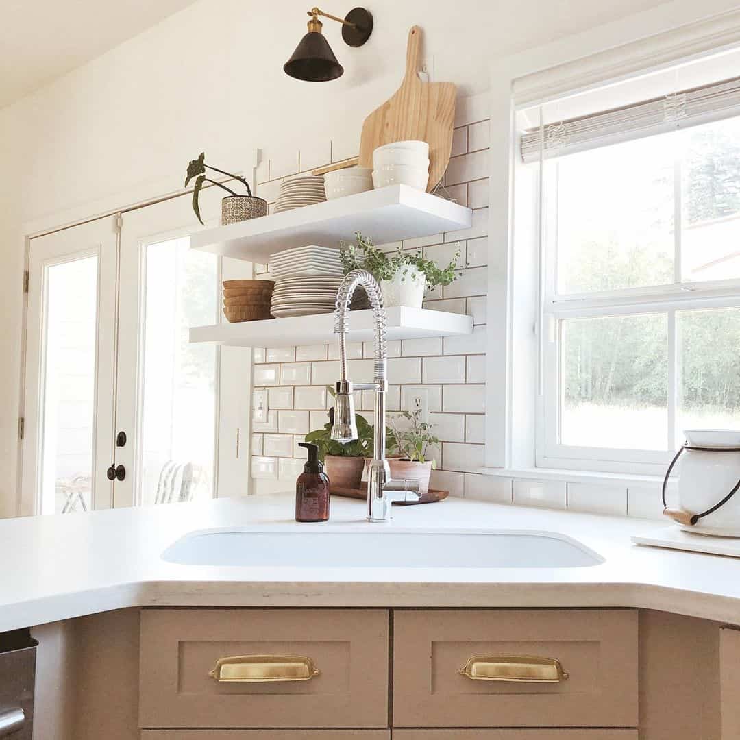 White Open Shelving Displays Dishes and Greenery