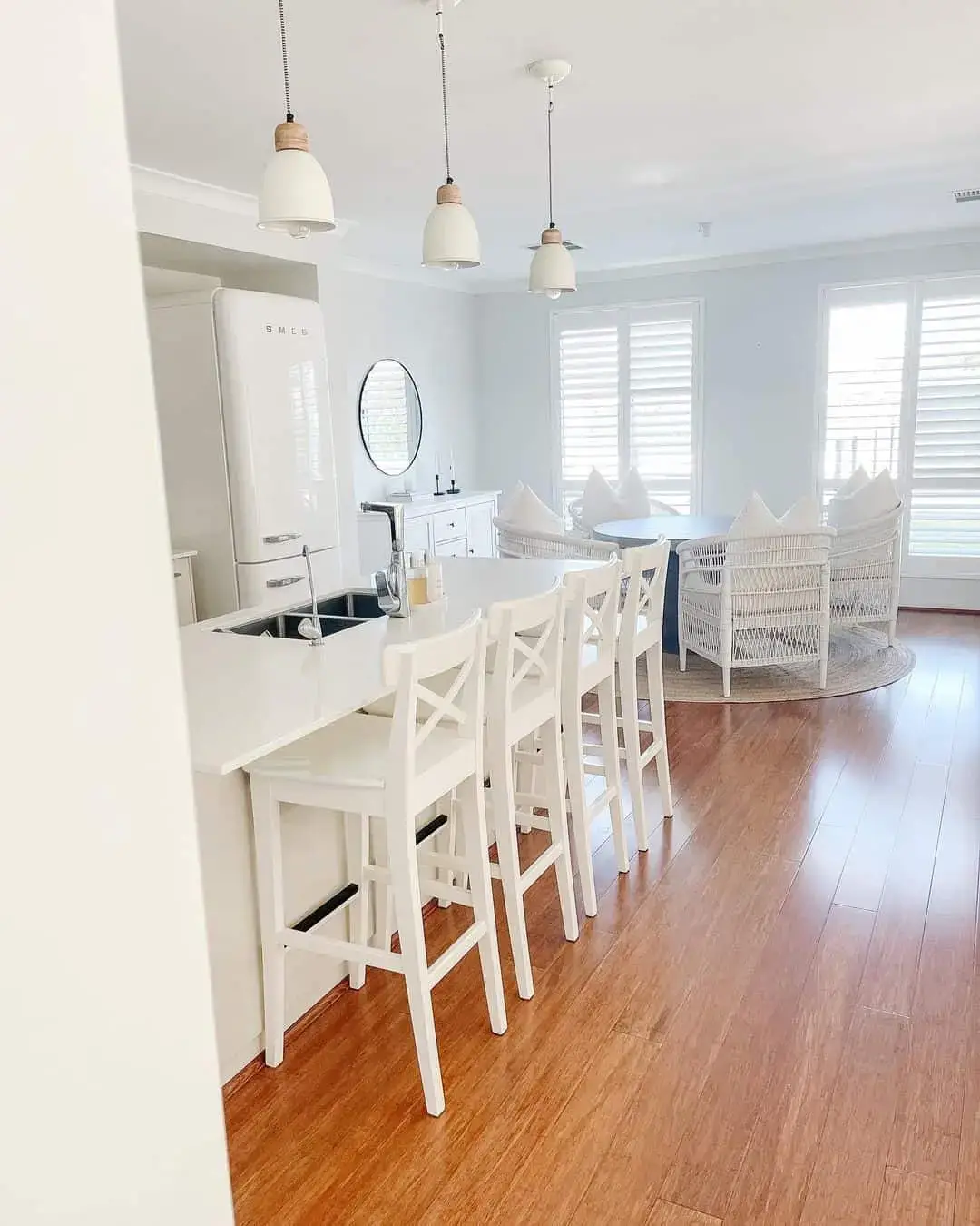 Define Your Island's Edge with White Cross-Back Stools