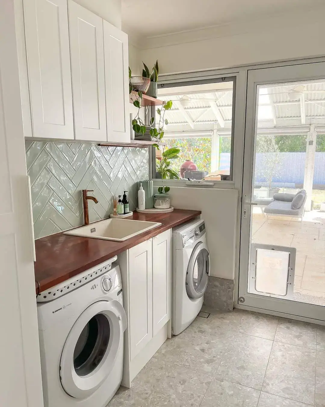 Pale Green Herringbone Tile Backsplash Adds Subtle Pattern