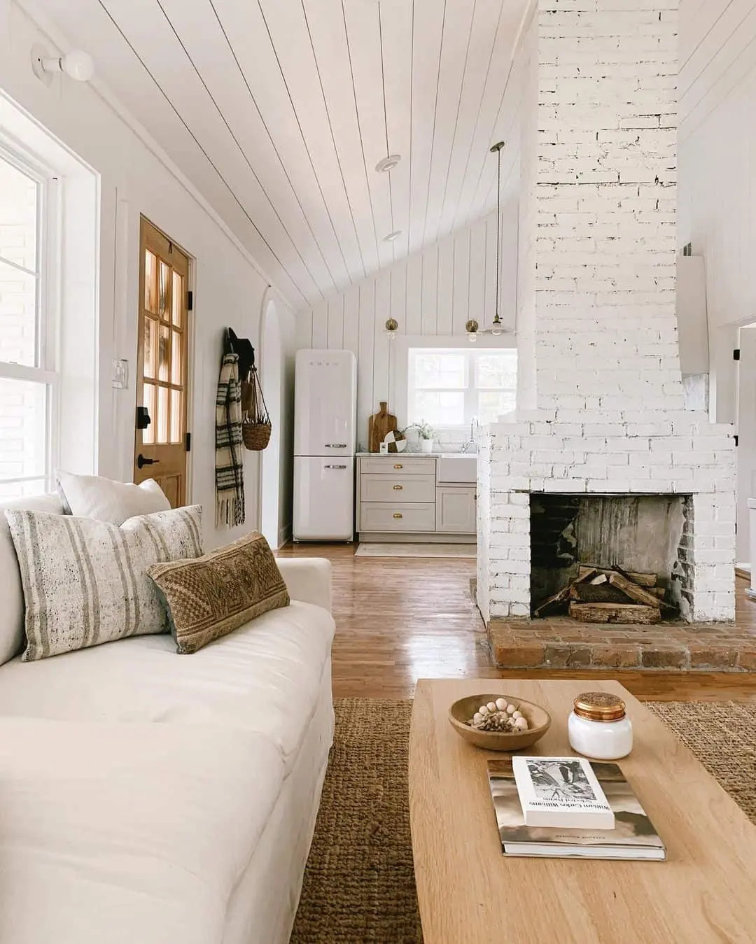 Textured Wood Coffee Table Enhances Fireplace Vignette