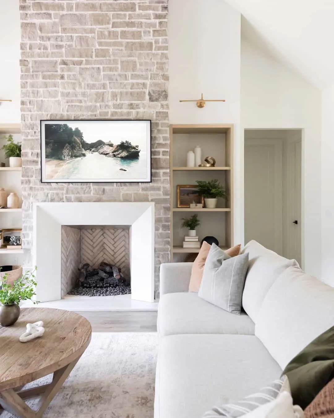 White Surround Highlights Herringbone Fireplace Interior