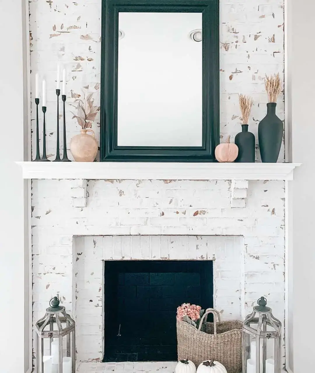 Dramatic Black Candlesticks Frame Fireplace Mantel