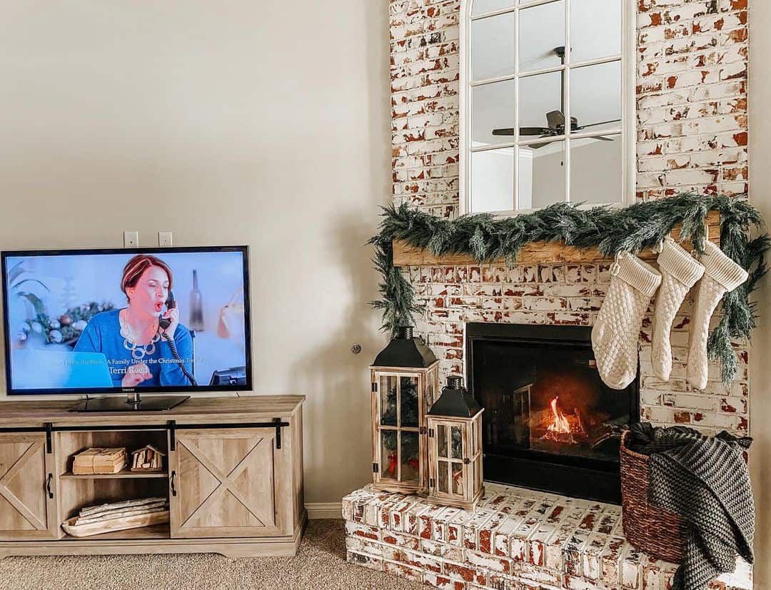 Festive Garland and Stockings Adorn Mantel