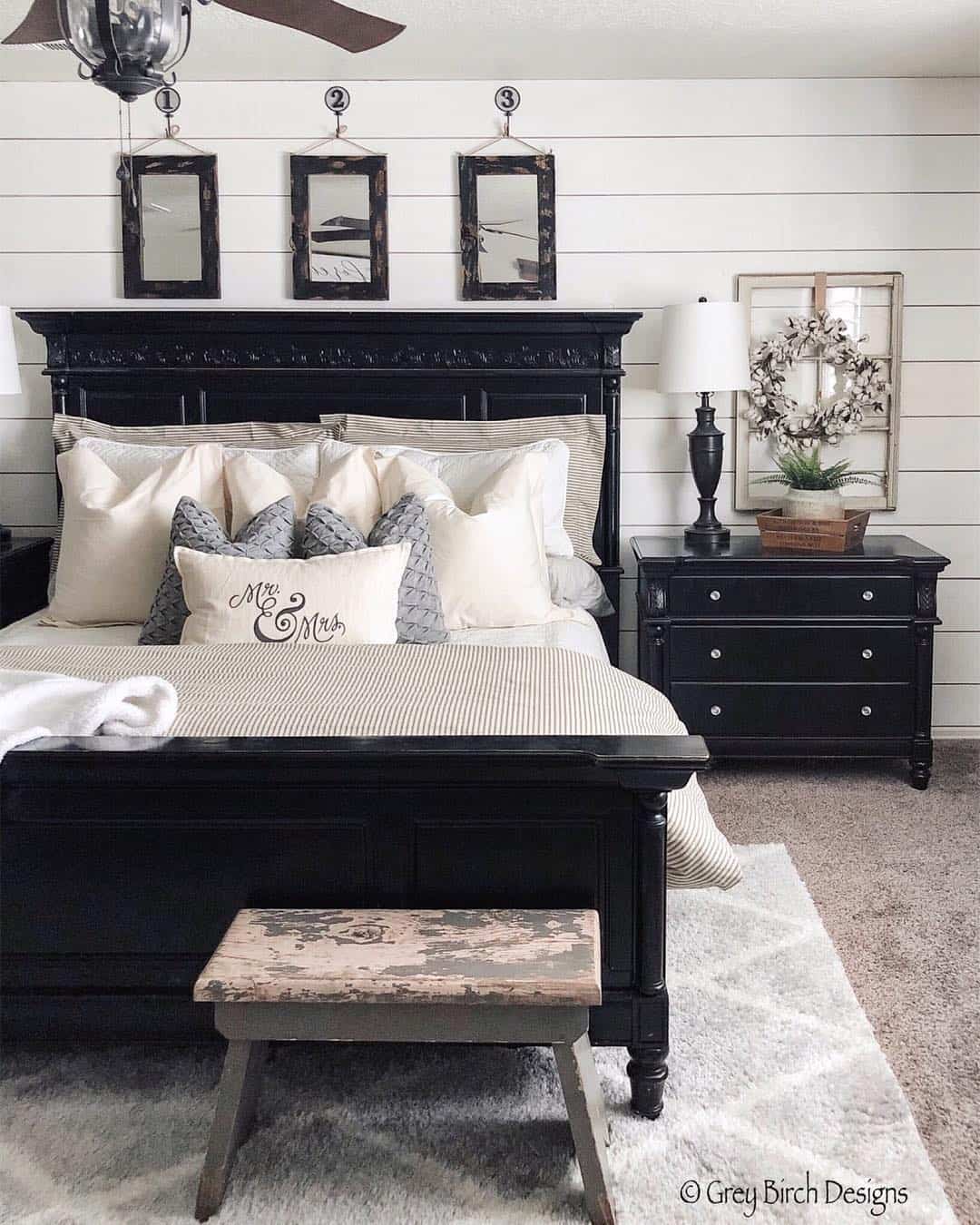 Three Small Mirrors Create a Triptych Above the Headboard