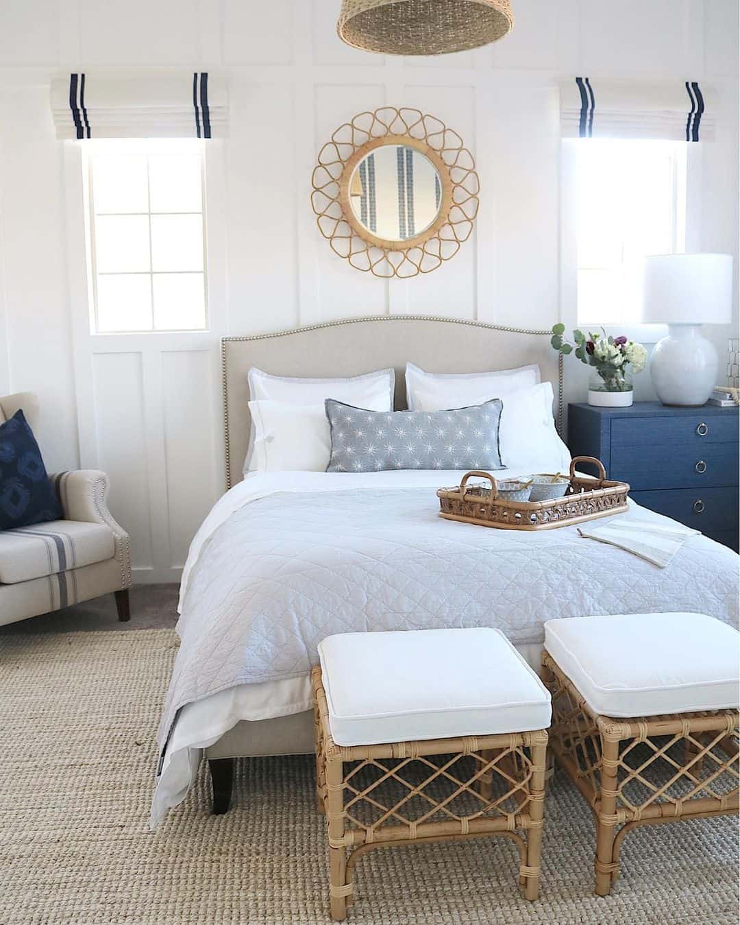 Round Rattan Mirror Frames A Serene Bedroom View