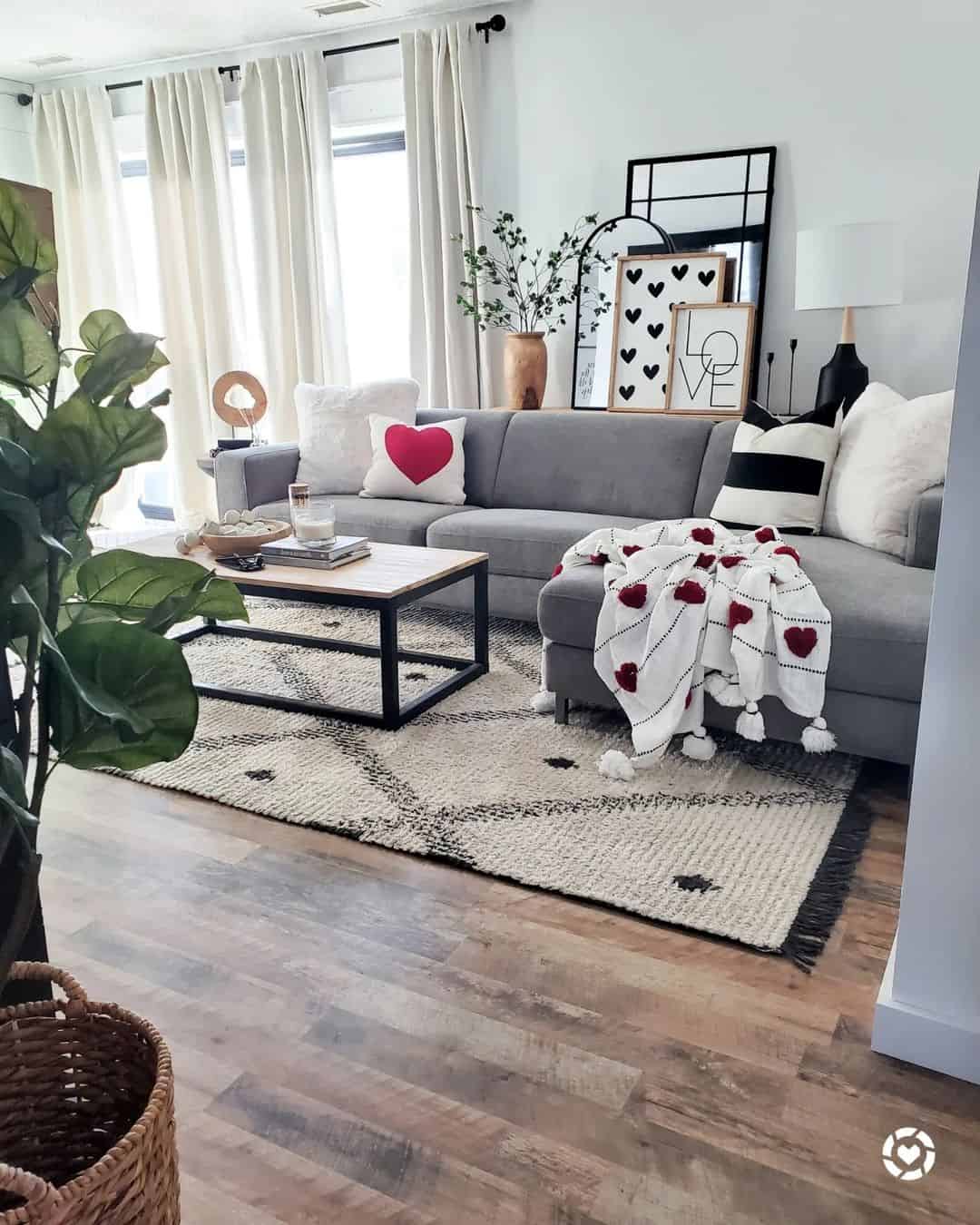 Layered Mirrors Create Depth Behind Sofa